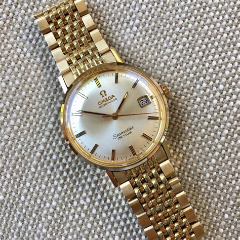 omega de ville gold watch seamaster mens gold band|Omega Seamaster de ville 1962.